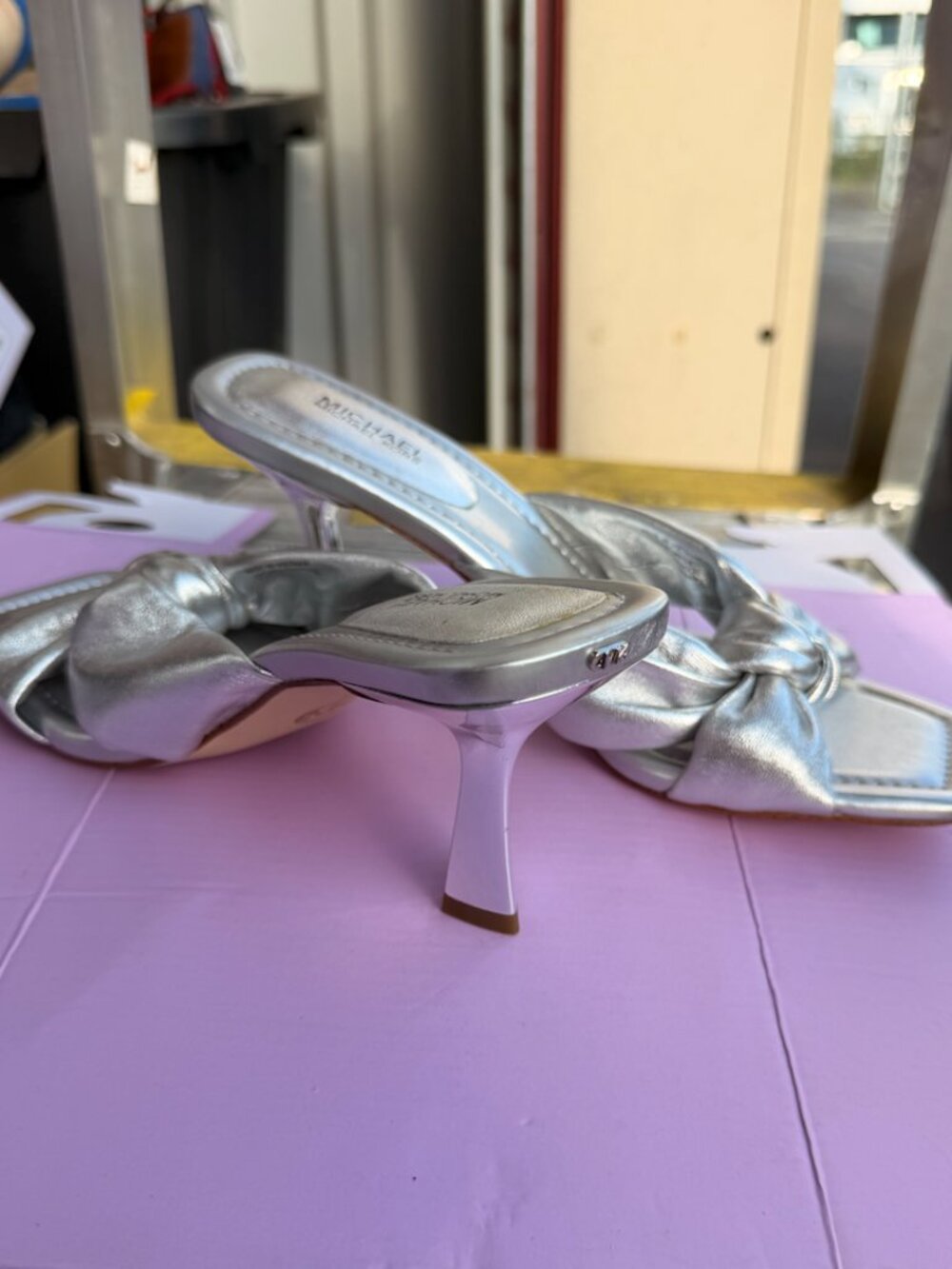 Michael Kors Silver Metallic Bow Mule Heels | Size 8 (Run small) - Picture 2 of 3